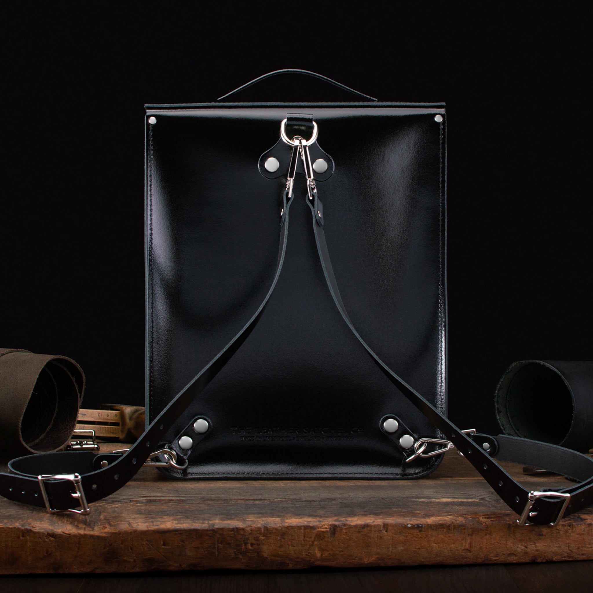 Medium Portrait Backpack in Patent Pitch Black