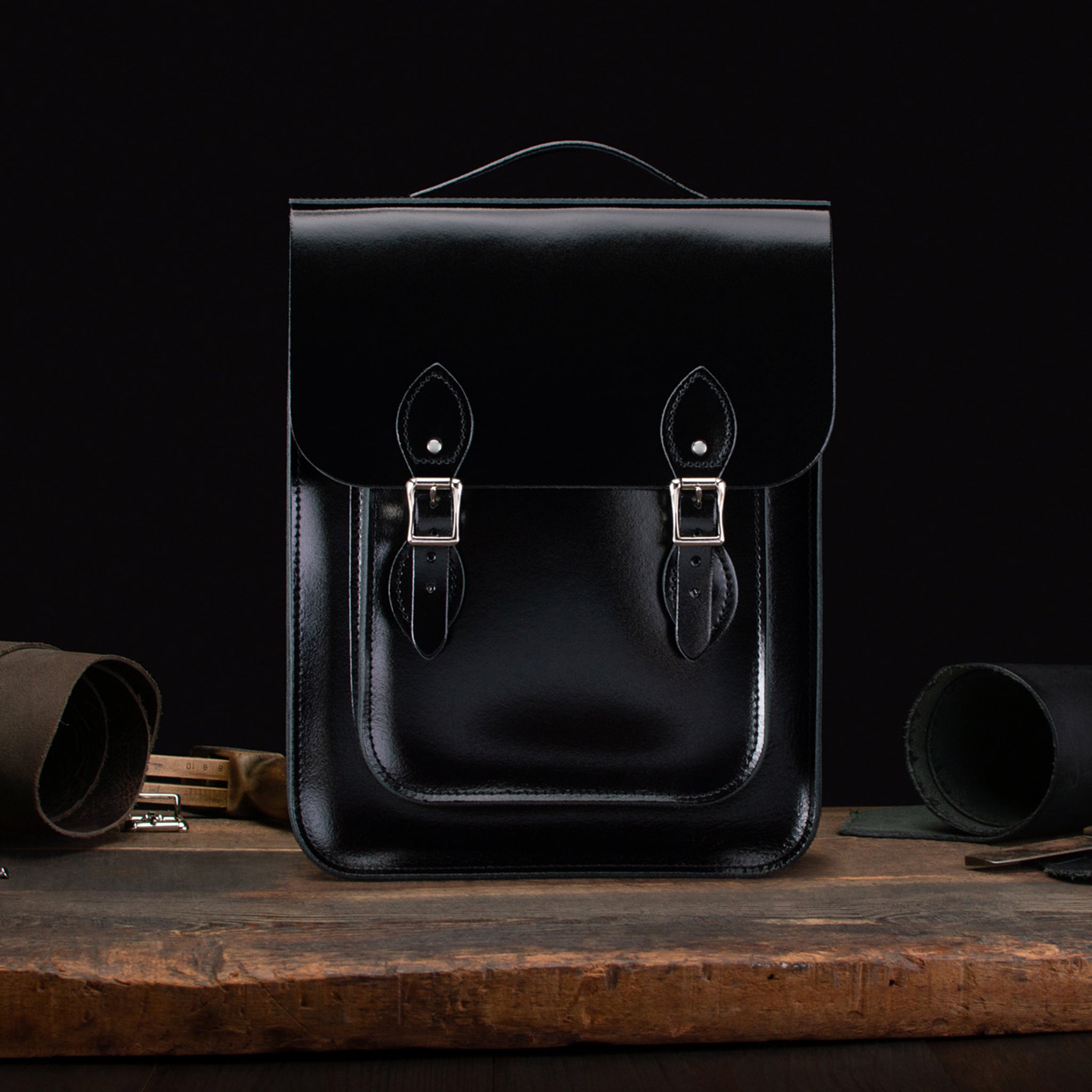 Medium Portrait Backpack in Patent Pitch Black